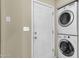 Efficient laundry area with stacked washer and dryer units for convenience at 4549 W Mclellan Rd, Glendale, AZ 85301