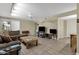 Open living room offers ample seating, a ceiling fan, and plenty of natural light at 4549 W Mclellan Rd, Glendale, AZ 85301