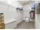 Walk in closet with wire shelving and carpeting, perfect for maximizing storage and organization at 46185 W Dutchman Dr, Maricopa, AZ 85139