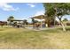 A modern community playground offers a safe and fun environment for children to play and socialize at 46185 W Dutchman Dr, Maricopa, AZ 85139
