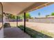 A patio and backyard with block fence at 4640 W Gail Dr, Chandler, AZ 85226