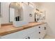 Elegant bathroom has a double sink vanity with modern fixtures and hardware at 4640 W Gail Dr, Chandler, AZ 85226