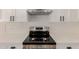 New oven in the kitchen has stainless steel appliances and white subway tile backsplash at 4640 W Gail Dr, Chandler, AZ 85226
