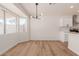 Bright open concept living room features new floors, neutral paint and backyard access at 4640 W Gail Dr, Chandler, AZ 85226