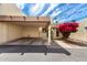Charming desert home features a two car carport, walkway, and vibrant bougainvillea at 5208 S Deborah Dr, Tempe, AZ 85283