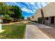 Well-maintained community grounds with lush green lawns, picnic tables, and walking paths for residents to enjoy at 5208 S Deborah Dr, Tempe, AZ 85283