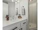 Bright bathroom featuring a white vanity, neutral towels and a glass enclosed shower at 5602 W Alameda Rd, Glendale, AZ 85310