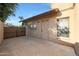 Backyard concrete area with gated access and neutral color paint for easy cleaning at 6101 W Grandview Rd, Glendale, AZ 85306
