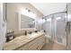 Bathroom with granite countertops, bathtub, and shower at 6101 W Grandview Rd, Glendale, AZ 85306