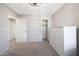 Neutral bedroom with carpet, walk-in closet, and a dresser at 6101 W Grandview Rd, Glendale, AZ 85306