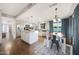 Bright and airy kitchen with stainless steel appliances and an island with granite countertops at 6101 W Grandview Rd, Glendale, AZ 85306