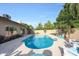 Inviting backyard pool with stone trim and landscaping offering a perfect oasis for relaxation and recreation at 6101 W Grandview Rd, Glendale, AZ 85306