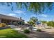 Charming backyard with a pool, lounge chairs, and a well-designed desert landscape at 6765 E Duane Ln, Scottsdale, AZ 85266