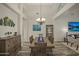 Open concept dining room with neutral tones, a chandelier, and wood floors at 6765 E Duane Ln, Scottsdale, AZ 85266
