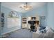 Comfortable home office featuring lots of natural light, a desk, and a sitting area at 6765 E Duane Ln, Scottsdale, AZ 85266