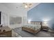 Serene bedroom with a comfortable bed, soft lighting, and large window views at 6765 E Duane Ln, Scottsdale, AZ 85266
