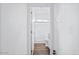 White bathroom features a walk in shower and tile floors at 7807 E Main St # F36, Mesa, AZ 85207