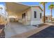 Cozy single-story home with covered parking and desert landscaping at 7807 E Main St # F36, Mesa, AZ 85207