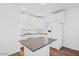 Well-lit kitchen features white cabinetry and modern appliances at 7807 E Main St # F36, Mesa, AZ 85207