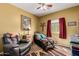 Relaxing bedroom with carpet, a ceiling fan, and nice natural lighting at 9938 E Little Nugget Way, Gold Canyon, AZ 85118