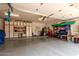 Spacious garage interior with storage cabinets, work area, and room for vehicle parking and projects at 9938 E Little Nugget Way, Gold Canyon, AZ 85118