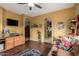 View of living room showcasing wood floors, open archways, and decorative furnishings at 9938 E Little Nugget Way, Gold Canyon, AZ 85118