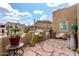 Charming patio area surrounded by desert landscaping with stunning mountain views at 9938 E Little Nugget Way, Gold Canyon, AZ 85118