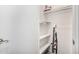 Spacious closet with shelves for organized storage at 10040 W Royal Oak Rd # N, Sun City, AZ 85351