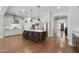 Spacious kitchen with a large island, modern appliances, and hardwood floors at 10154 E Bergeron Ave, Mesa, AZ 85212