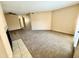 Spacious carpeted living room offering a ceiling fan and bright natural light at 11640 N 51St Ave # 248, Glendale, AZ 85304