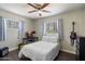 Bedroom with a desk, chair, and guitar at 1210 W Missouri Ave, Phoenix, AZ 85013