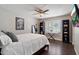 Bedroom featuring decor, a television, and a window with shutters at 1210 W Missouri Ave, Phoenix, AZ 85013