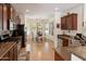 Bright eat-in kitchen features stainless steel appliances, granite countertops, and a breakfast nook with abundant natural light at 125 N 107Th Dr, Avondale, AZ 85323