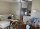 Spacious living room with high ceilings, plush seating, and modern decor at 1406 W Emerald Ave # 124, Mesa, AZ 85202
