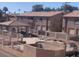 Complex swimming pool with seating, gazebo and fenced perimeter at 1406 W Emerald Ave # 124, Mesa, AZ 85202
