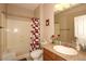 Full bathroom featuring a shower-tub combo, granite counter, and neutral tones at 14000 N 94Th St # 1031, Scottsdale, AZ 85260