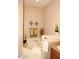 Relaxing bathroom featuring a soaking tub, decorative towels, and neutral wall tones at 14000 N 94Th St # 1031, Scottsdale, AZ 85260
