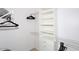 Organized closet with white shelving and ample storage space for clothing and accessories at 14000 N 94Th St # 1031, Scottsdale, AZ 85260