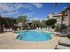 Apartment community pool with lounge chairs at 14000 N 94Th St # 1031, Scottsdale, AZ 85260