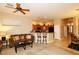 Comfortable living area with open layout, breakfast bar, and dining space offers seamless flow and functionality at 14000 N 94Th St # 1031, Scottsdale, AZ 85260
