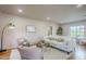 Cozy living room featuring hardwood floors, a comfortable sofa, and tasteful decor at 1551 W Vernon Ave, Phoenix, AZ 85007