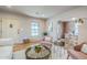 Open living area with hardwood floors, comfortable seating, and stylish decor at 1551 W Vernon Ave, Phoenix, AZ 85007