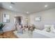 Bright living room with hardwood floors, stylish furniture, and contemporary decor at 1551 W Vernon Ave, Phoenix, AZ 85007