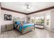 Spacious main bedroom with bay window and tile floors at 16280 W Desert Winds Dr, Surprise, AZ 85374