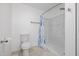 Clean bathroom with toilet, shower, and modern fixtures at 1654 S 77Th St, Mesa, AZ 85209