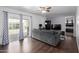 Comfortable living room with sliding glass doors, ceiling fan, and a gray sofa at 1654 S 77Th St, Mesa, AZ 85209