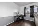 Bright office area with modern desk, chair, and large window at 1654 S 77Th St, Mesa, AZ 85209