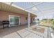 Covered patio with lattice shade, perfect for outdoor dining and relaxation, enhancing the outdoor living experience at 1654 S 77Th St, Mesa, AZ 85209