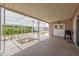 Inviting patio featuring a lattice cover, providing a shaded retreat for outdoor relaxation and entertaining at 1654 S 77Th St, Mesa, AZ 85209