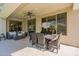 Relaxing covered patio area, perfect for outdoor dining and lounging at 18868 E Mockingbird Dr, Queen Creek, AZ 85142